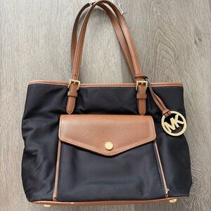 Michael Kors Black Tote with Brown Trim and Gold MK Charm jet set